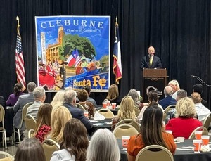 Scott Cain receiving the Champion for Cleburne award